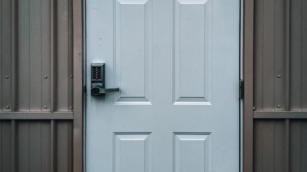 A commercial side door with a keypad lock